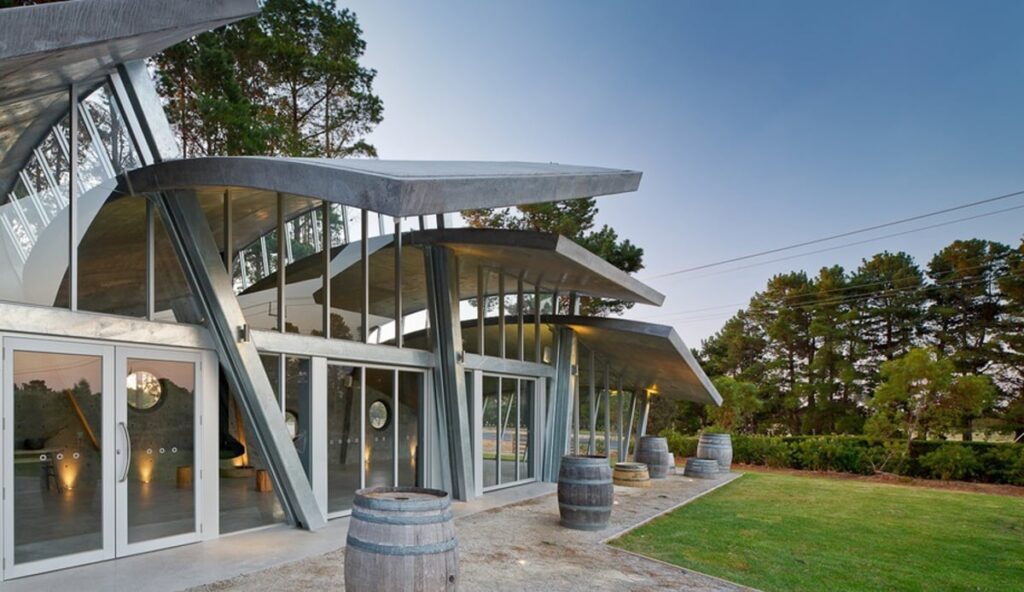 Winery Day Tours vineyard view | Adelaide Hills wine tasting tour | Barossa Valley wine and food experience | McLaren Vale coastal vineyard | Yarra Valley winery day trip | Mornington Peninsula vineyard lunch | Small group wine tasting tour | Luxury winery tour experience | Couples enjoying wine at vineyard | Corporate winery event tour