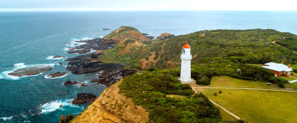 Winery Day Tours vineyard view | Adelaide Hills wine tasting tour | Barossa Valley wine and food experience | McLaren Vale coastal vineyard | Yarra Valley winery day trip | Mornington Peninsula vineyard lunch | Small group wine tasting tour | Luxury winery tour experience | Couples enjoying wine at vineyard | Corporate winery event tour