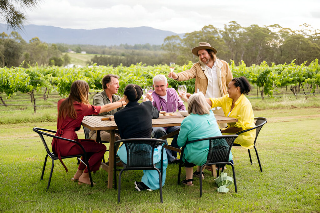 Winery Day Tours vineyard view | Adelaide Hills wine tasting tour | Barossa Valley wine and food experience | McLaren Vale coastal vineyard | Yarra Valley winery day trip | Mornington Peninsula vineyard lunch | Small group wine tasting tour | Luxury winery tour experience | Couples enjoying wine at vineyard | Corporate winery event tour